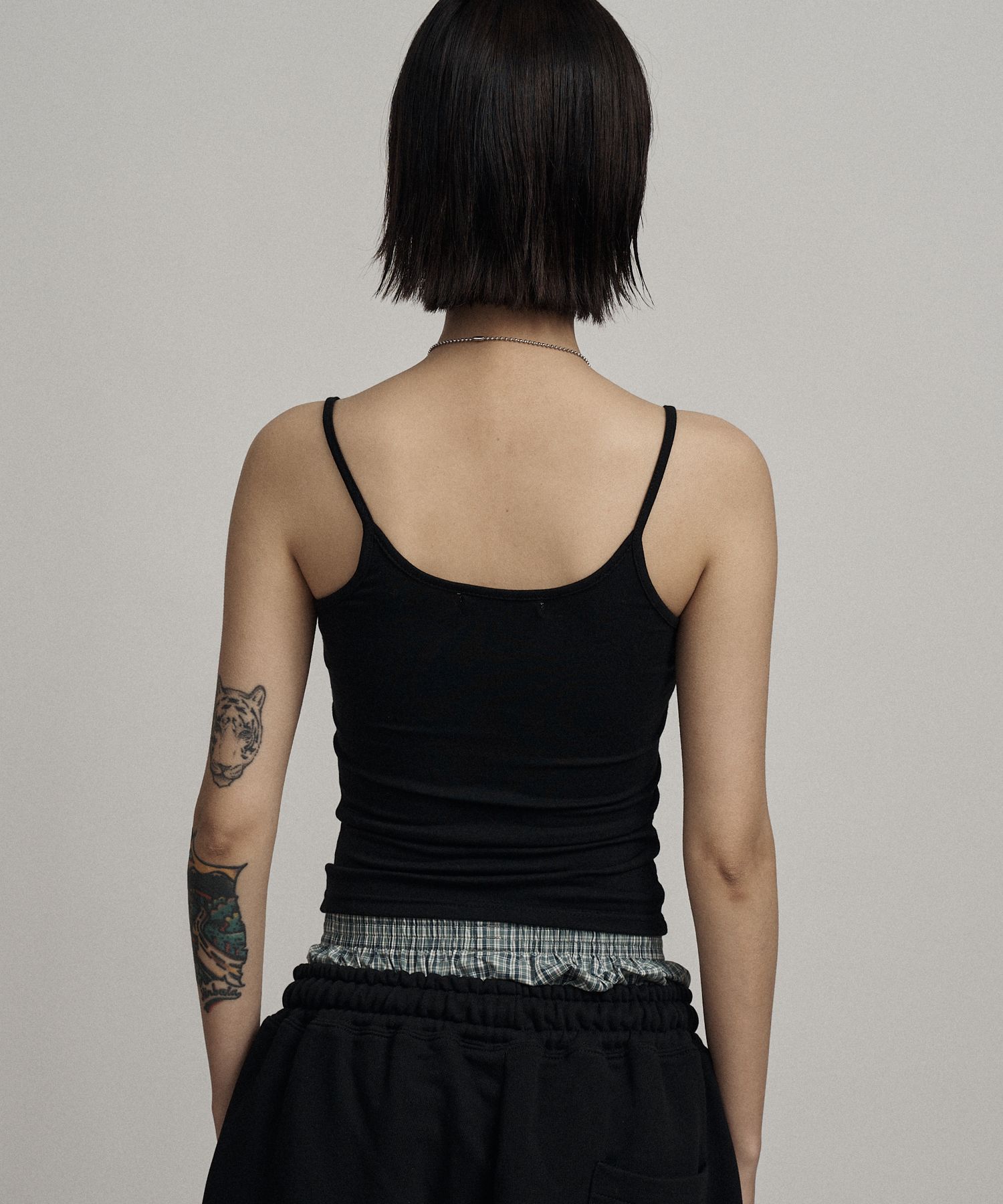 MUSINSA | ILLIO Black leopard cross necklace sleeveless