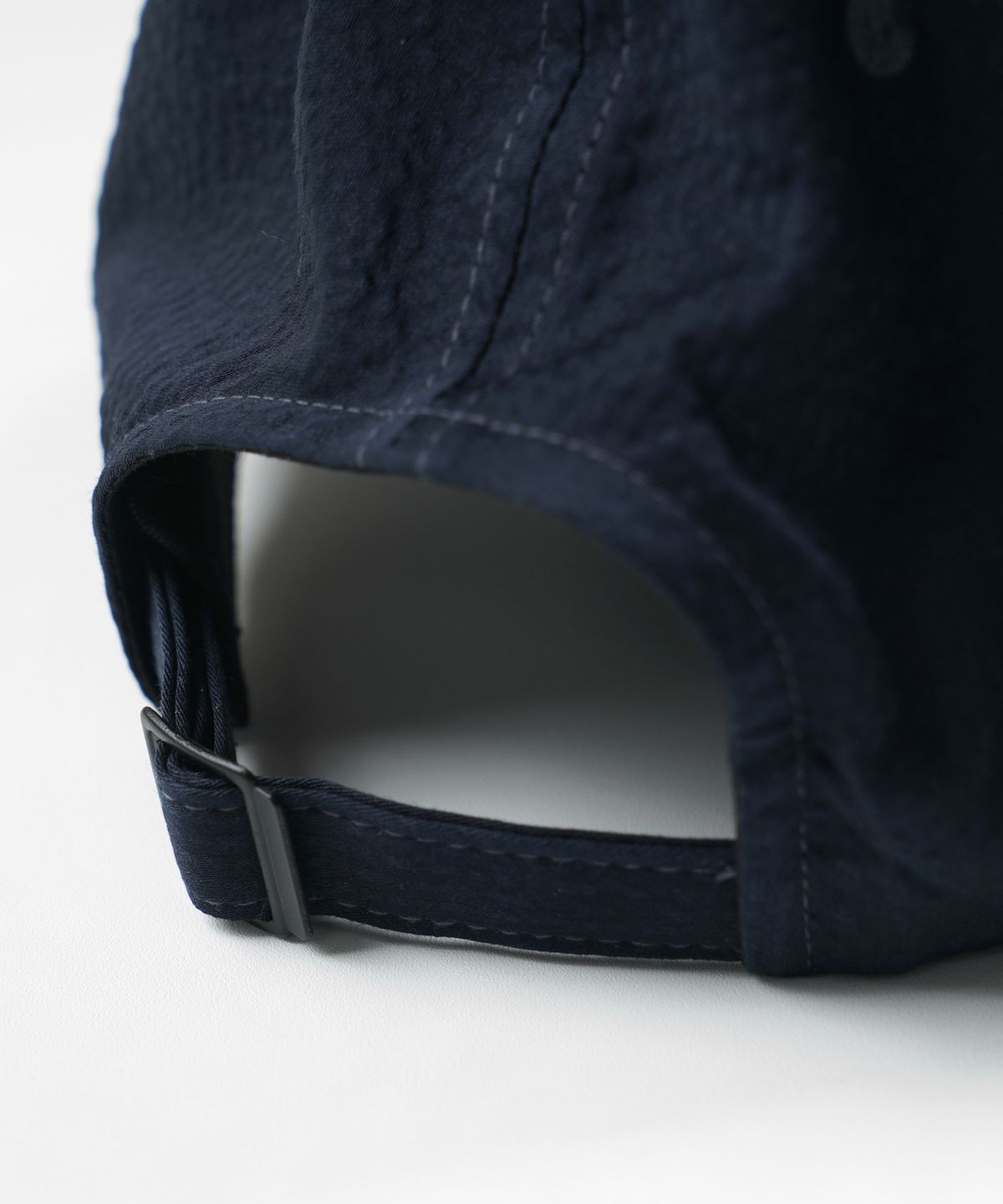 프리즘웍스(FRIZMWORKS) SEERSUCKER FEATHER CAP _ NAVY
