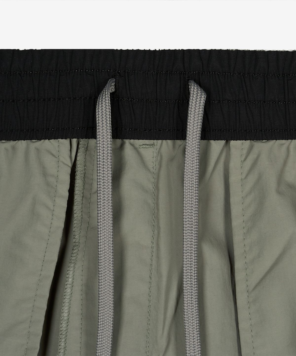 뉴발란스(NEW BALANCE) NBNVG31443 / UNI 헤리티지 4.5부 쇼츠 (KHAKI)