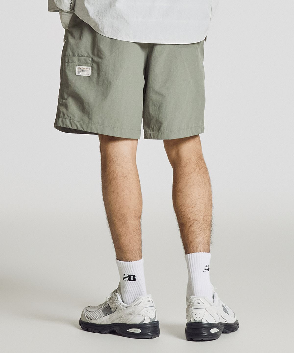 뉴발란스(NEW BALANCE) NBNVG31443 / UNI 헤리티지 4.5부 쇼츠 (KHAKI)