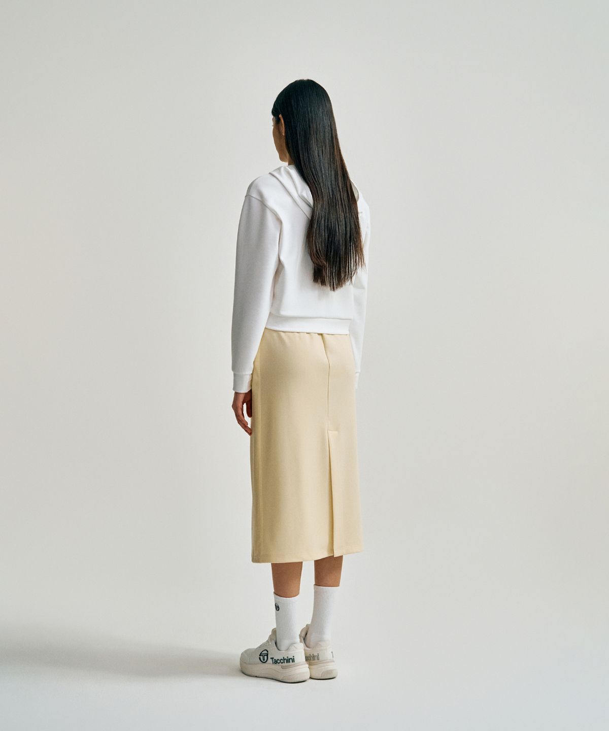 세르지오 타키니(SERGIO TACCHINI) W 타키니 모던 트랙 미디 스커트 (L.Yellow)