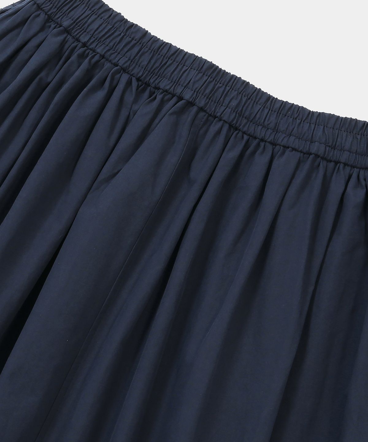 컬럼비아 유니버시티(COLUMBIA UNIVERSITY) ALL-ROUND PLEATS COTTON LONG SKIRTS 크라운네이비