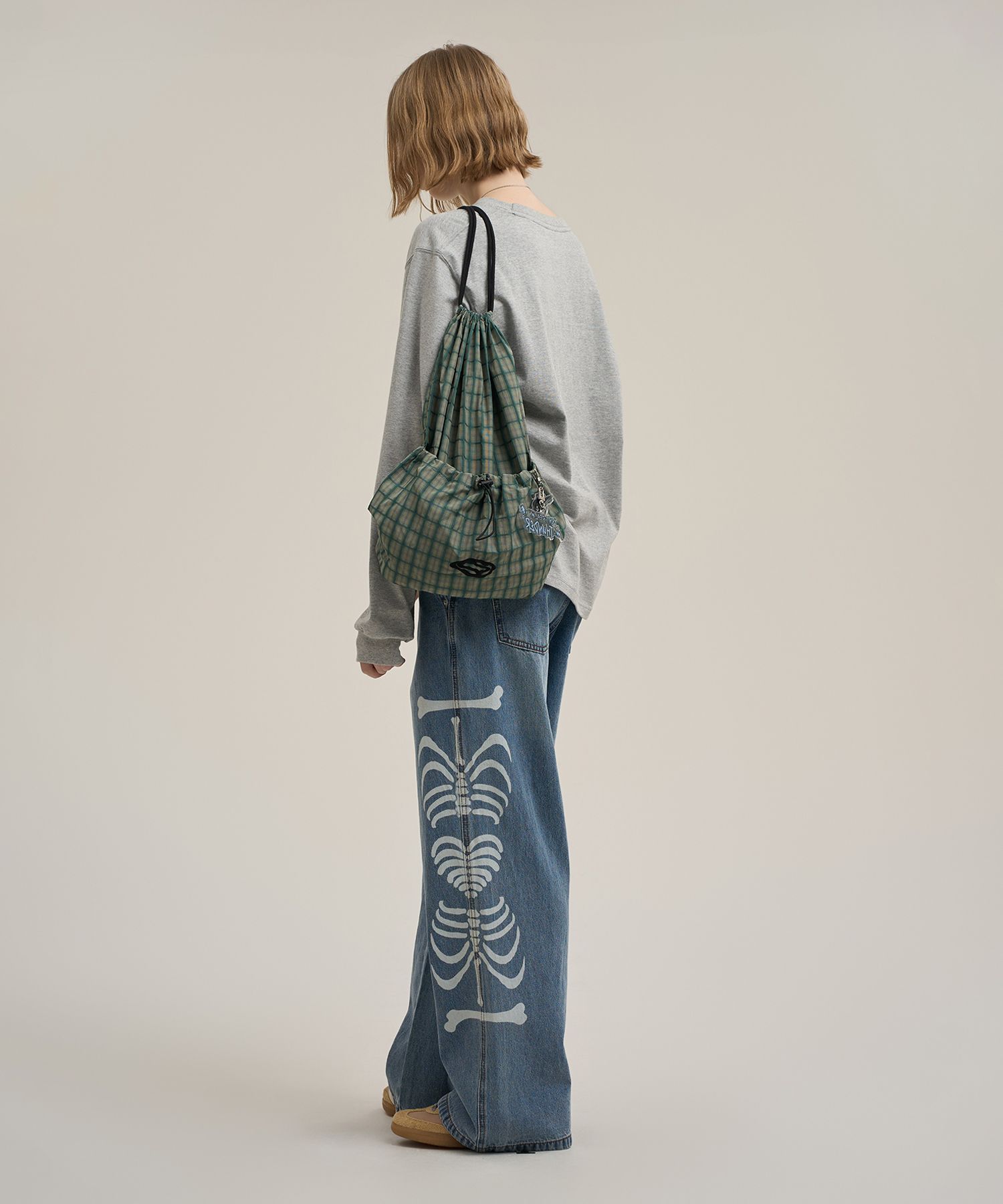 MUSINSA | SUPERSUB SWAVER CHECK STRING BACKPACK - GREEN