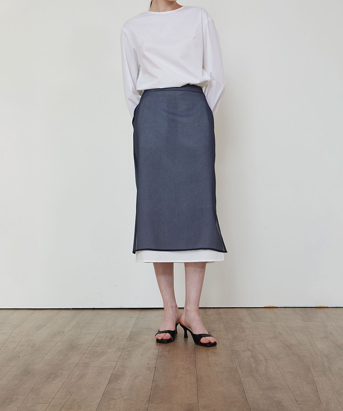 스텝어라운드(STEP AROUND) See-through H-line layered skirt_NAVY