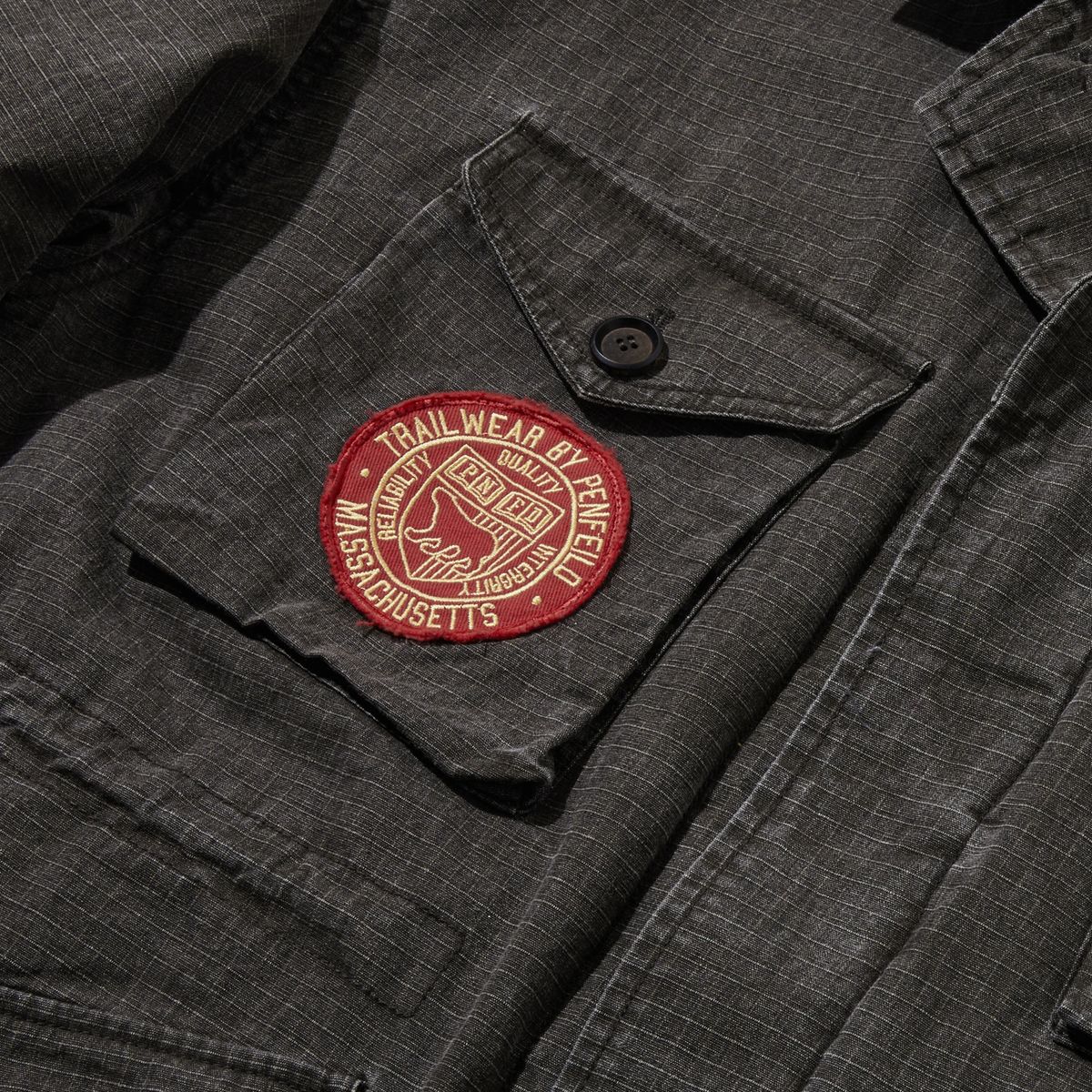 펜필드(PENFIELD) [TRAILWEAR] 아사벳 패치 필드 자켓 다크블랙_FR1WJ82U