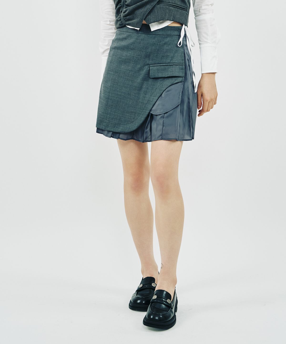 페노메논시퍼(PHENOMENON SEEPER) LINING PLEATS SKIRT