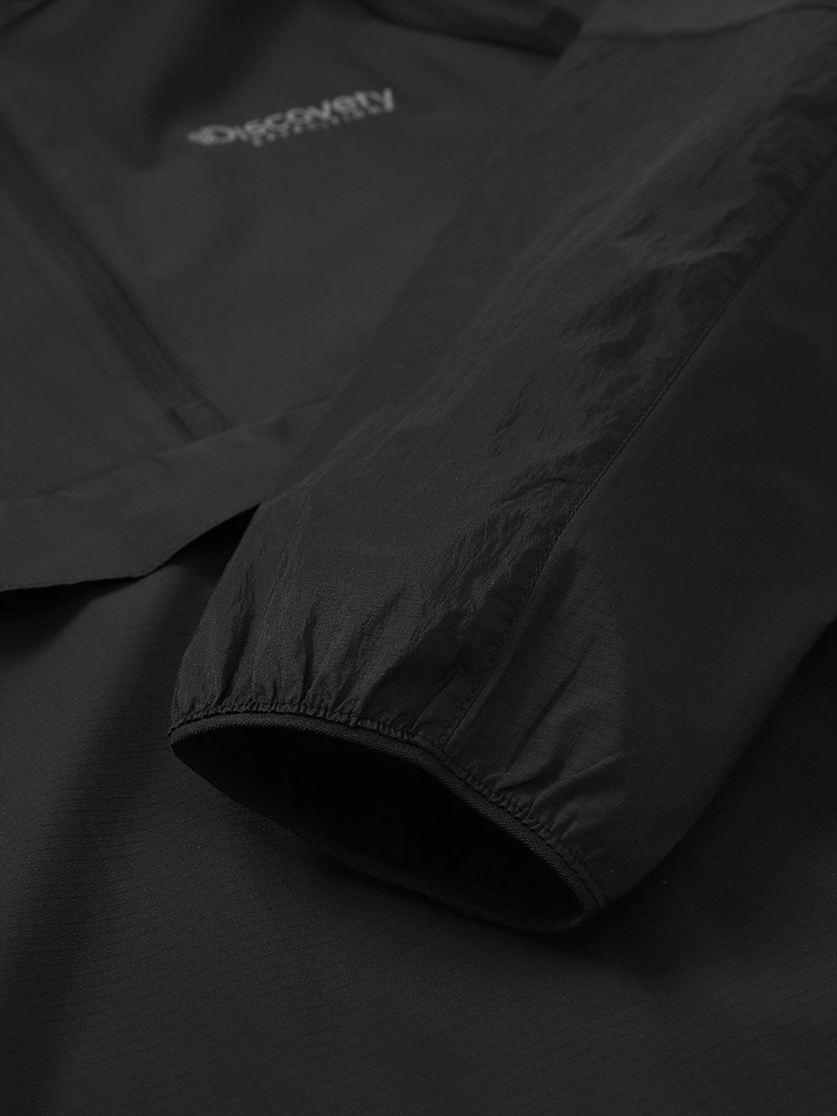디스커버리 익스페디션(DISCOVERY EXPEDITION) 프레시벤트 립스탑 아노락 바람막이 (BLACK)