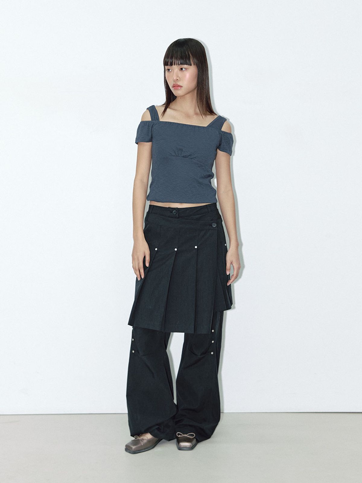 아수라(ASURA) ATYPICAL RIVET PLEATS SKIRT (BLACK)