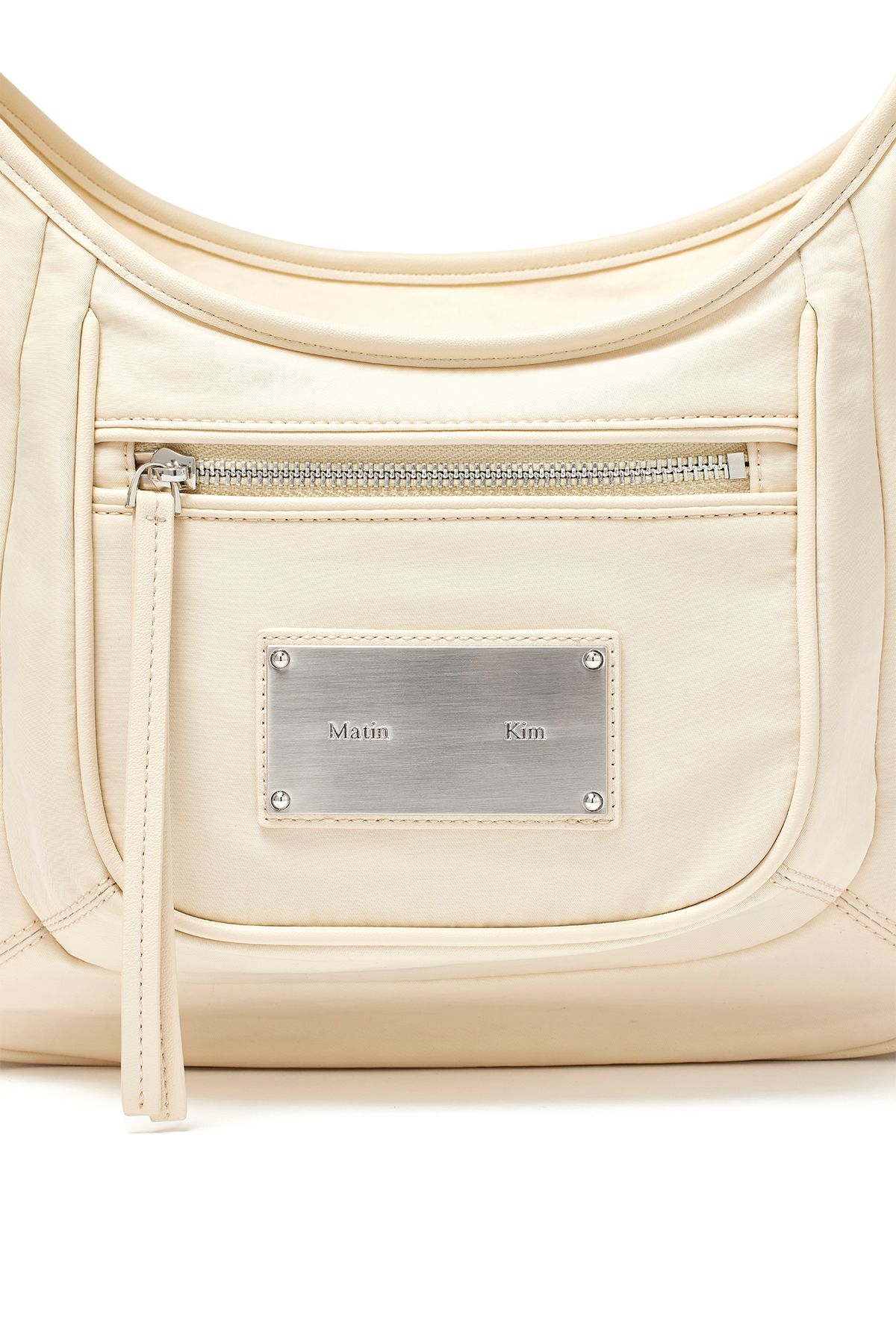 MUSINSA | MATIN KIM NYLON POCKET BAG IN BEIGE