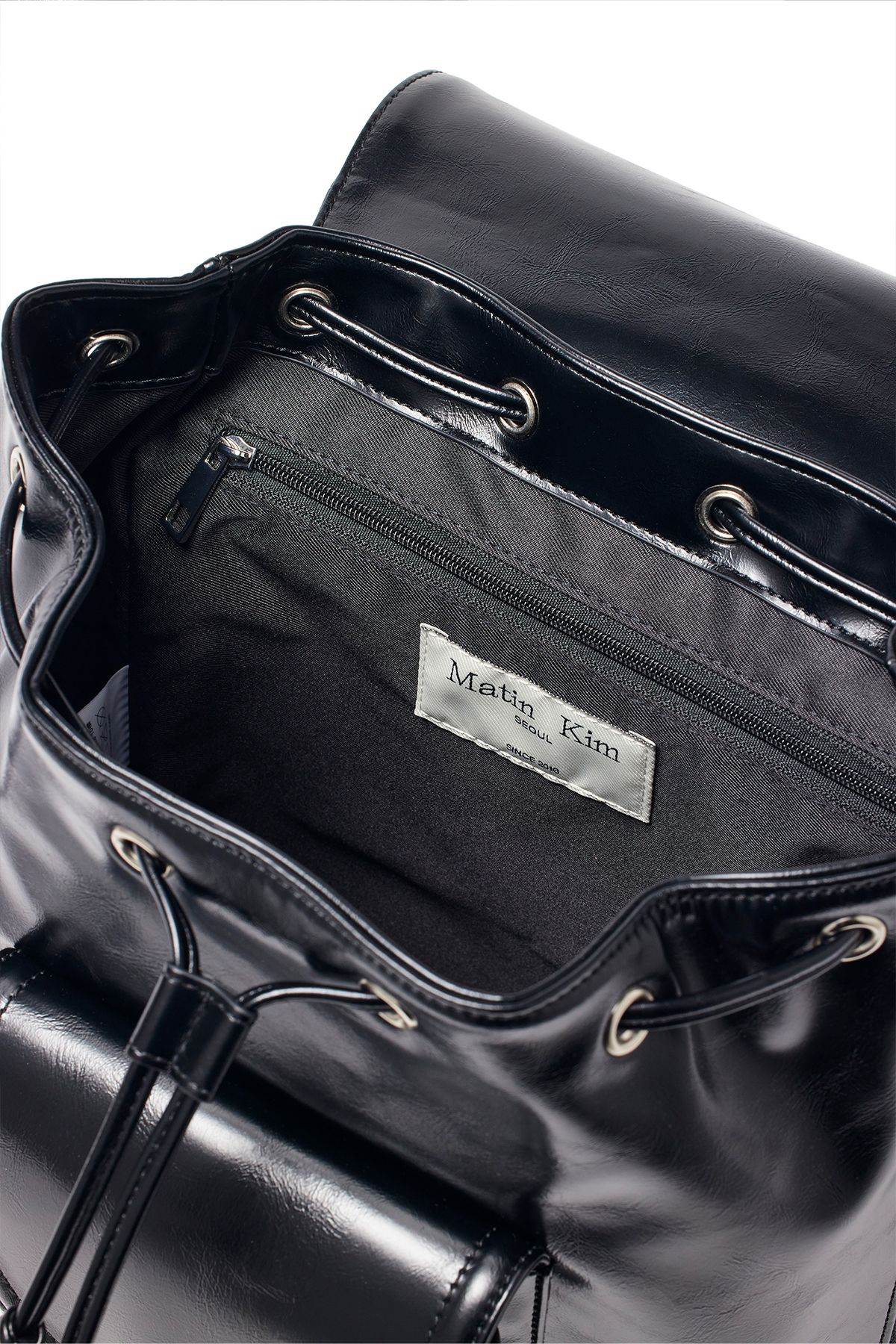 MUSINSA公式 | MATIN KIM BUCKLE DETAIL BACK PACK IN BLACK