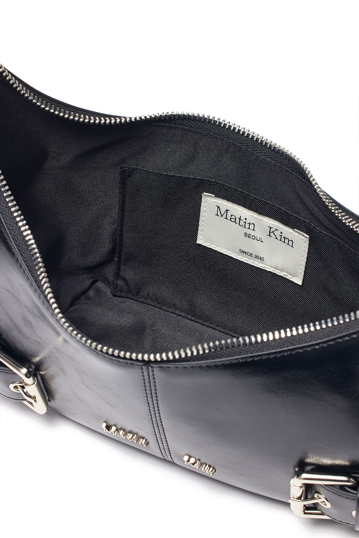 MUSINSA | MATIN KIM BELTED SHOULDER BAG IN BLACK