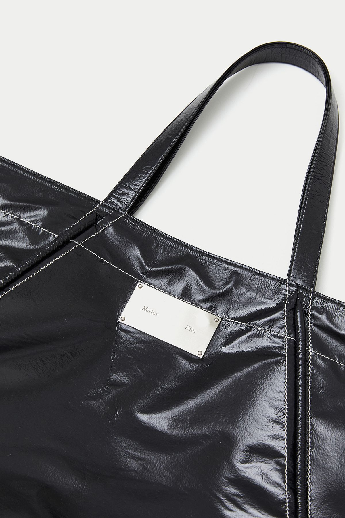 MUSINSA | MATIN KIM BIG COATING TOTE BAG IN BLACK