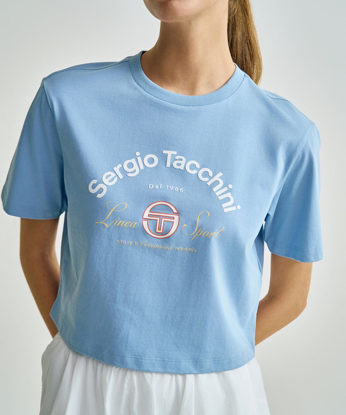 세르지오 타키니(SERGIO TACCHINI) W 쿨매치 아트웍 크롭 반팔 티셔츠 (L.Indigo)