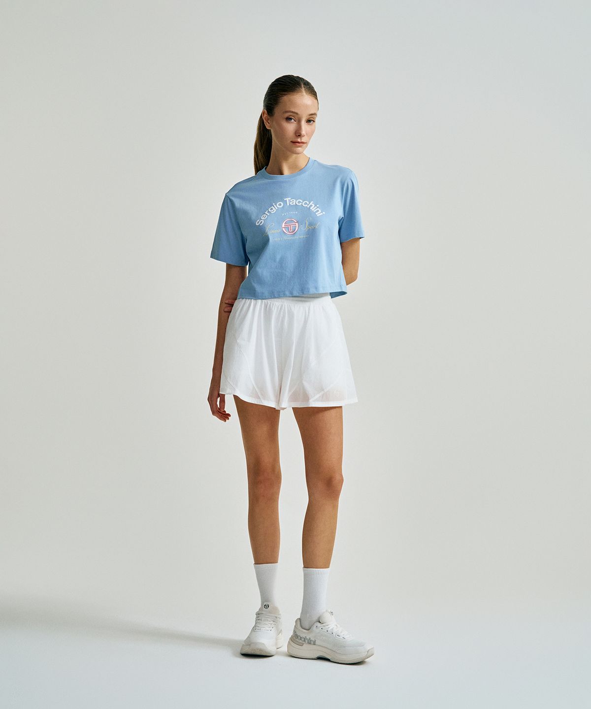 세르지오 타키니(SERGIO TACCHINI) W 쿨매치 아트웍 크롭 반팔 티셔츠 (L.Indigo)