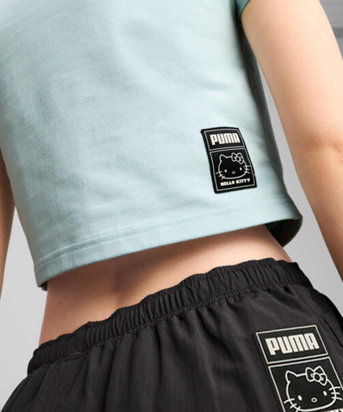 푸마(PUMA) 푸마 x 헬로키티 그래픽 베이비 티 - 모던미스트 / 631613-67