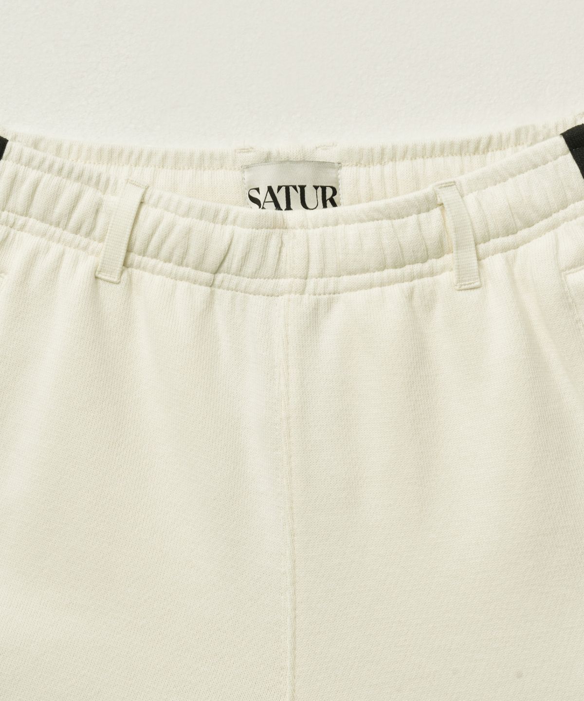 세터(SATUR) (W) 로턴 올 데이 트랙 쇼츠 아트 블랙