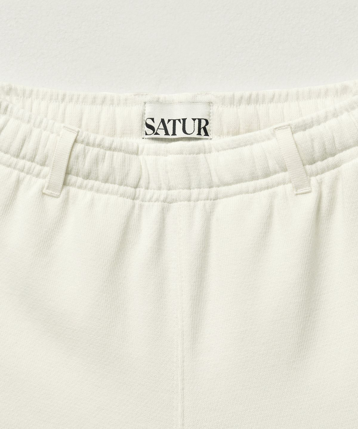 세터(SATUR) (W) 로턴 올 데이 트랙 쇼츠 화이트