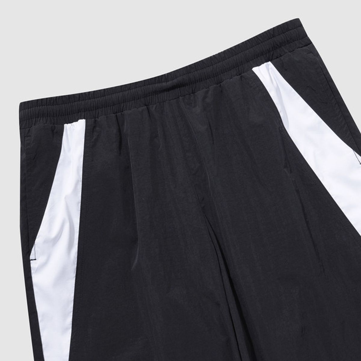 엄브로(UMBRO) 팝러쉬 컬러블럭 스트레이트 & 조거 2WAY 팬츠 블랙(UQ123CPT31)