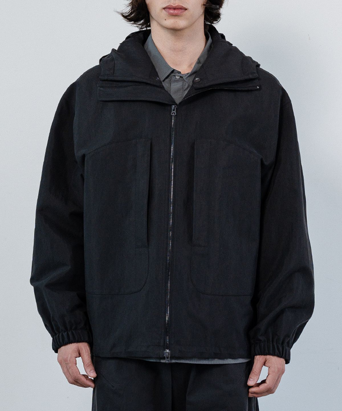 우석(WOOSUK) Round Pocket Storm Jacket