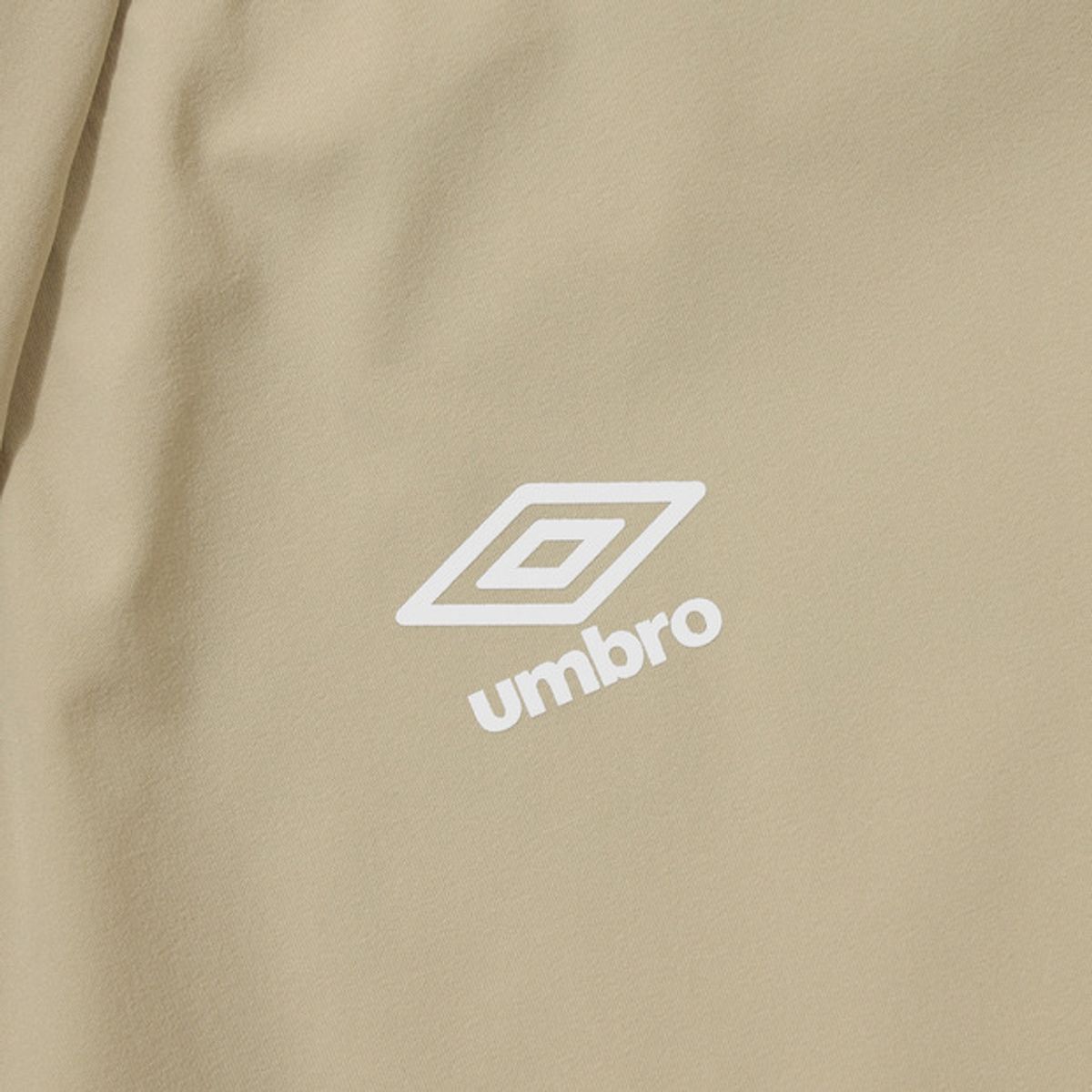 엄브로(UMBRO) 액티브 올라운드 스트레치 반팔 피스테 베이지(UQ121SWT32)