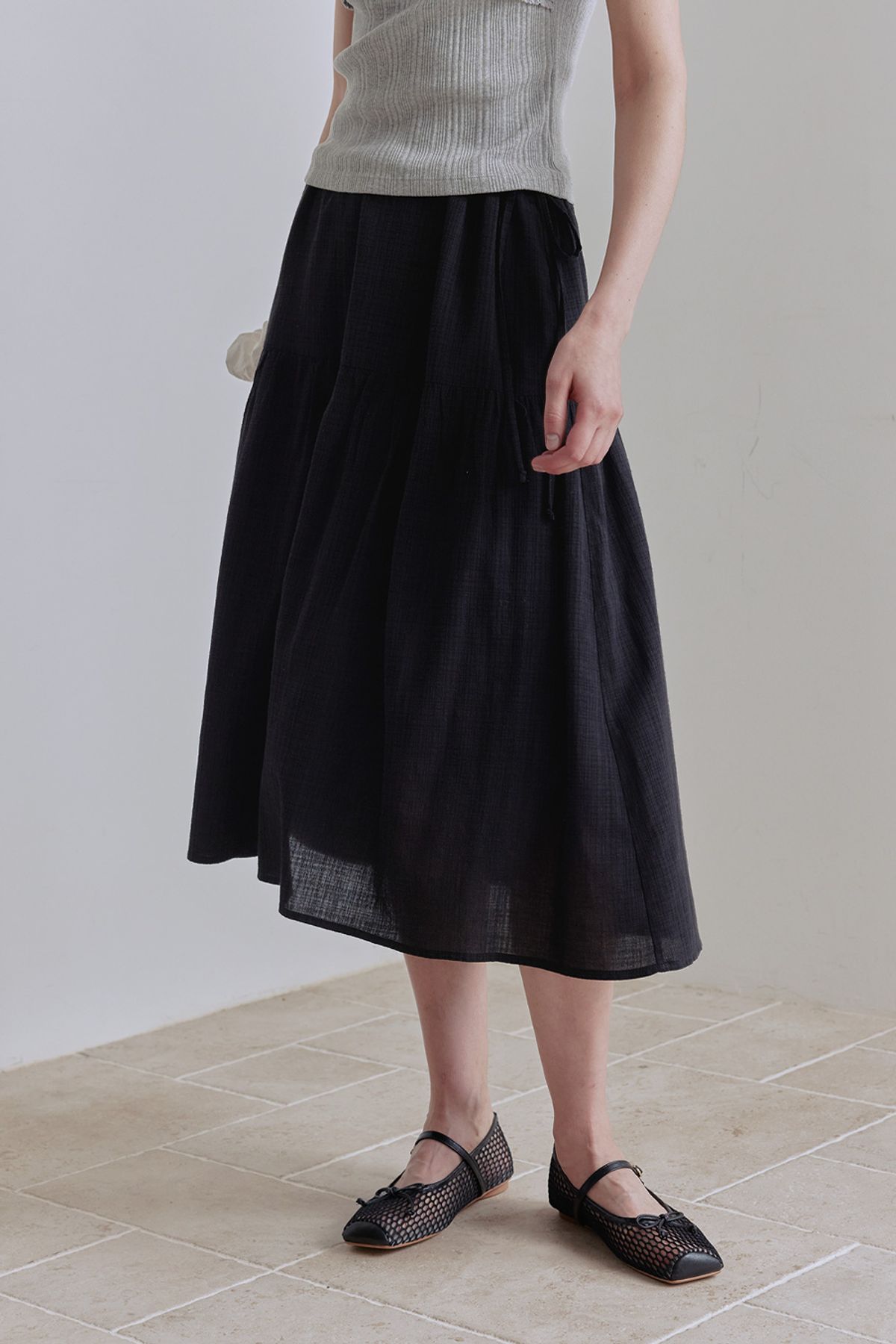 애프터아워즈(AFTERHOURS) EASY STRING FLARE SKIRT (BLACK)