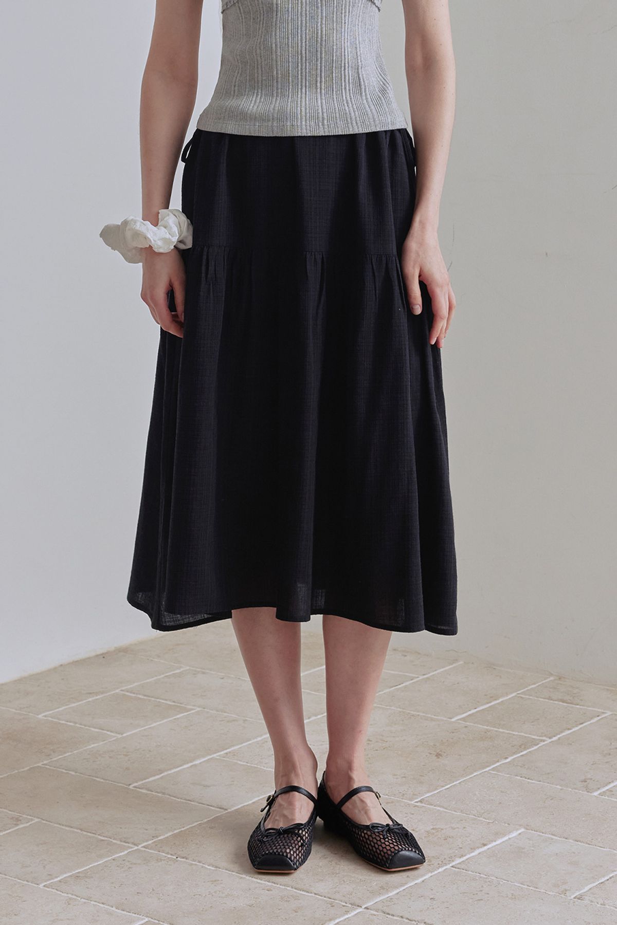 애프터아워즈(AFTERHOURS) EASY STRING FLARE SKIRT (BLACK)