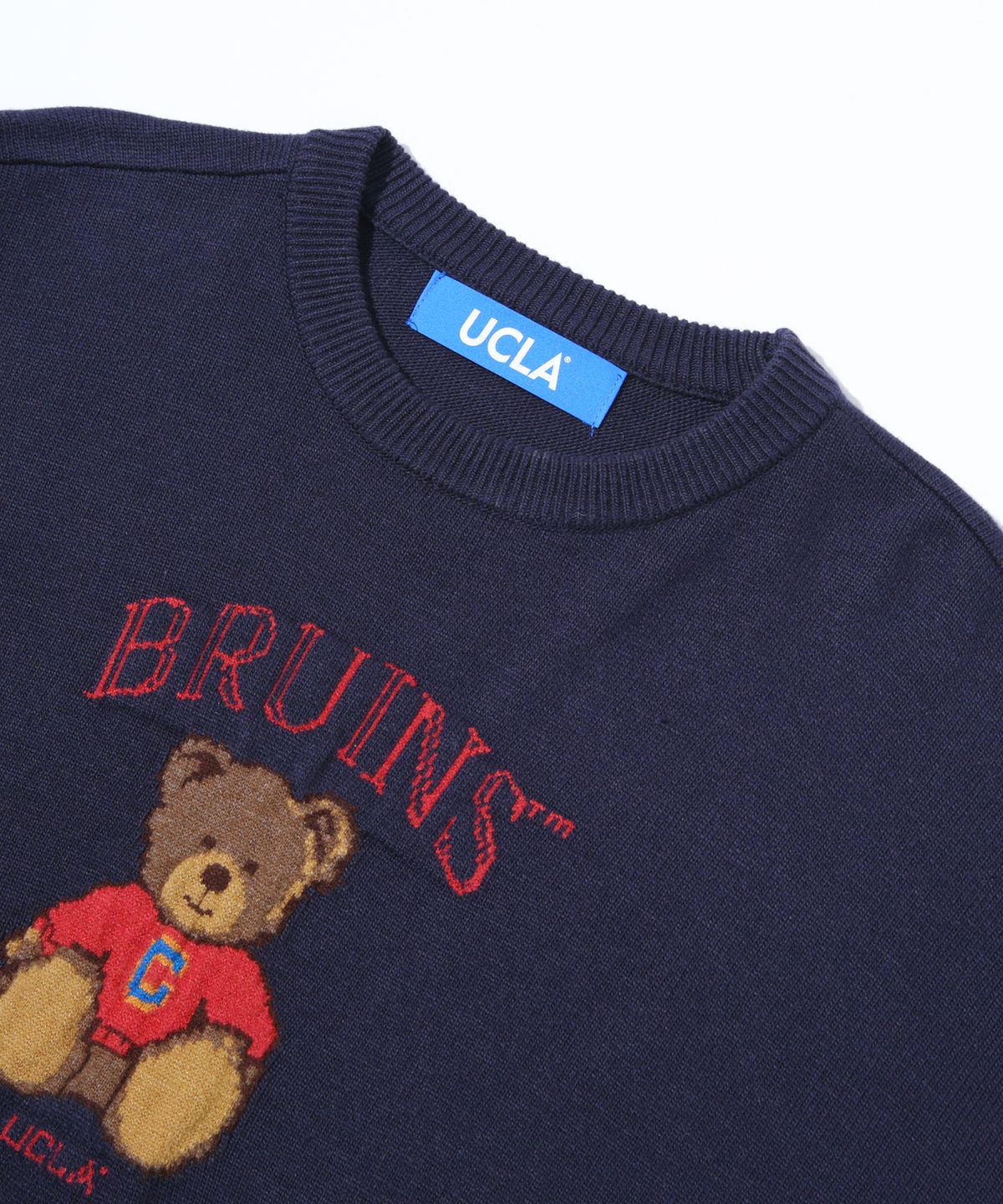 유씨엘에이(UCLA) 여성 일러스트 쟈가드 라운드넥 스웨터[NAVY](UB2LK83)