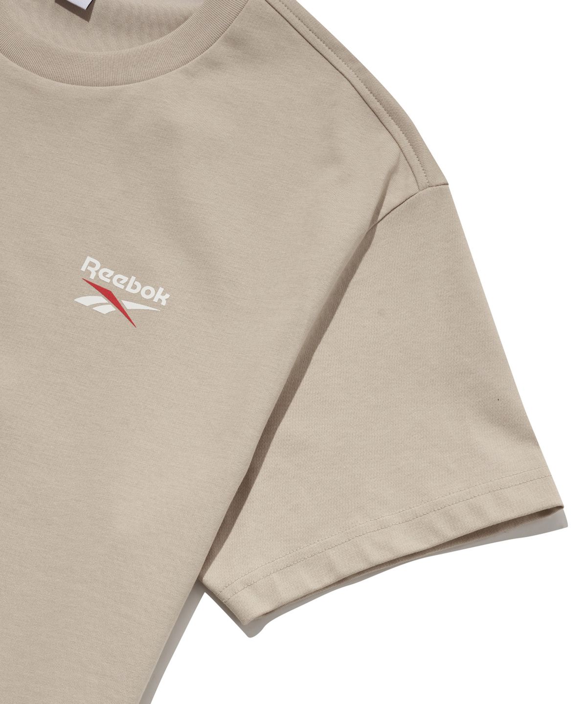 리복(REEBOK) 빅벡터 슬로건 티셔츠 - 베이지