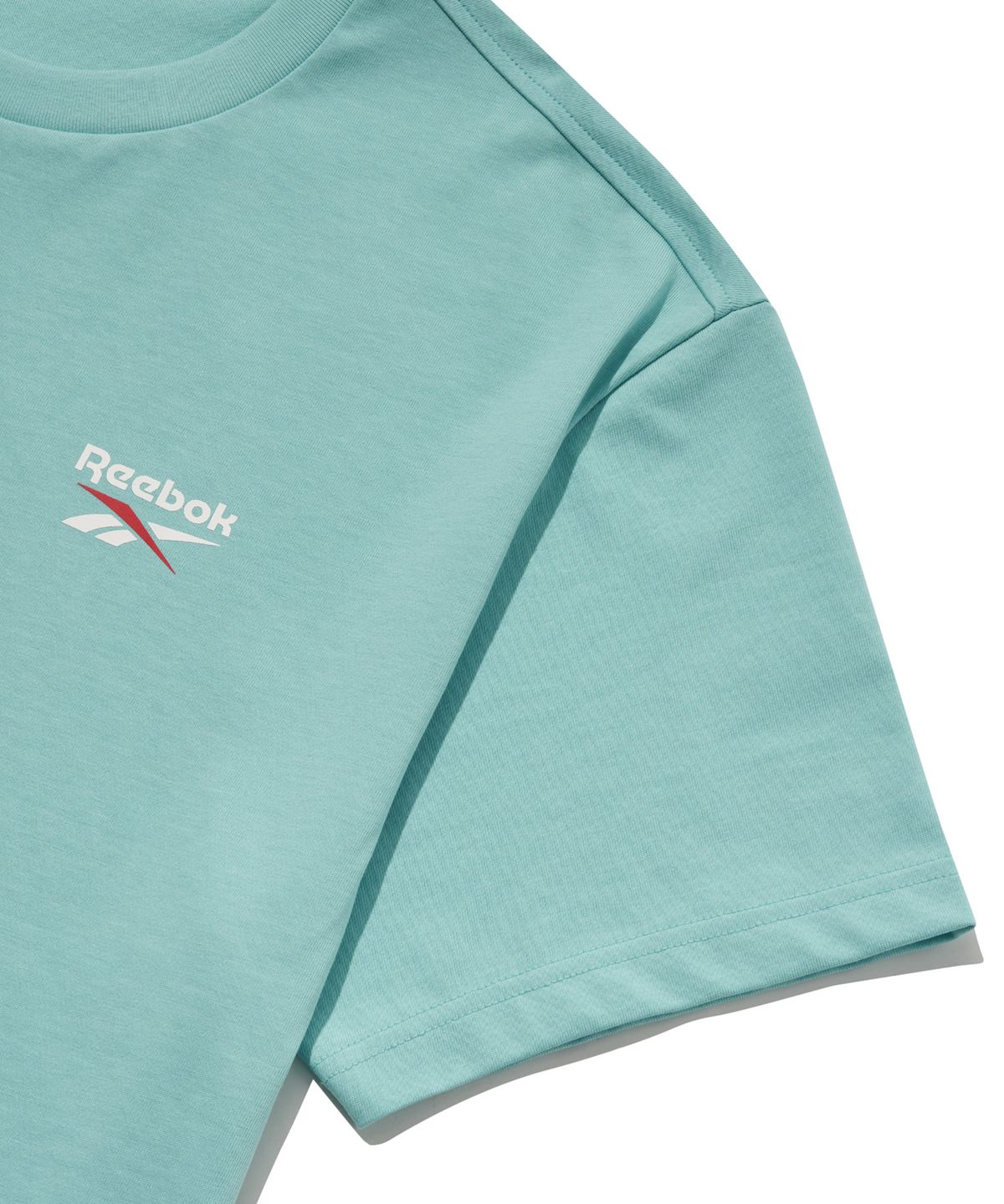 리복(REEBOK) 빅벡터 슬로건 티셔츠 - 민트