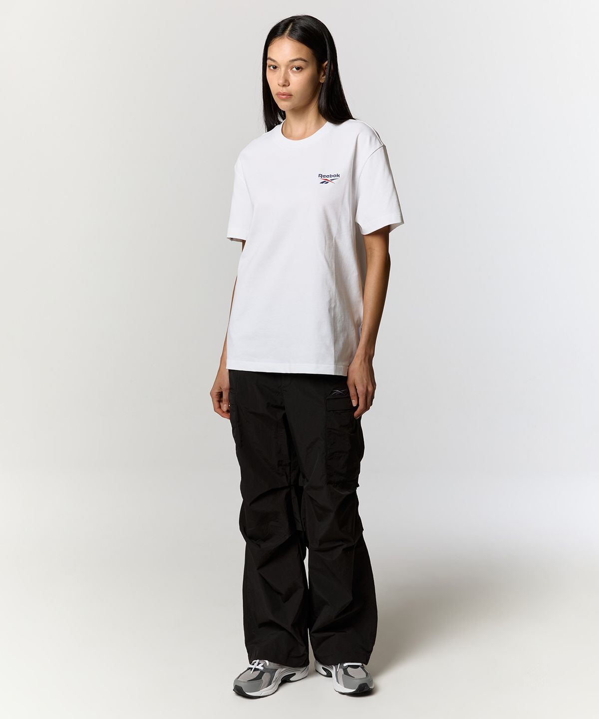 리복(REEBOK) 빅벡터 슬로건 티셔츠 - 화이트