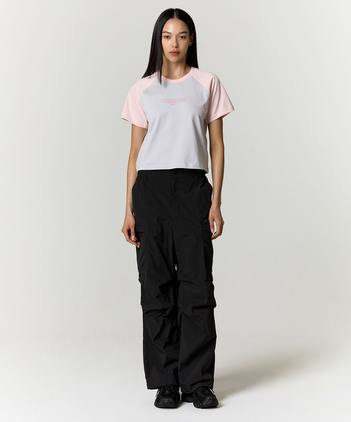 리복(REEBOK) 프린트 래글런 티셔츠 (W) - 핑크