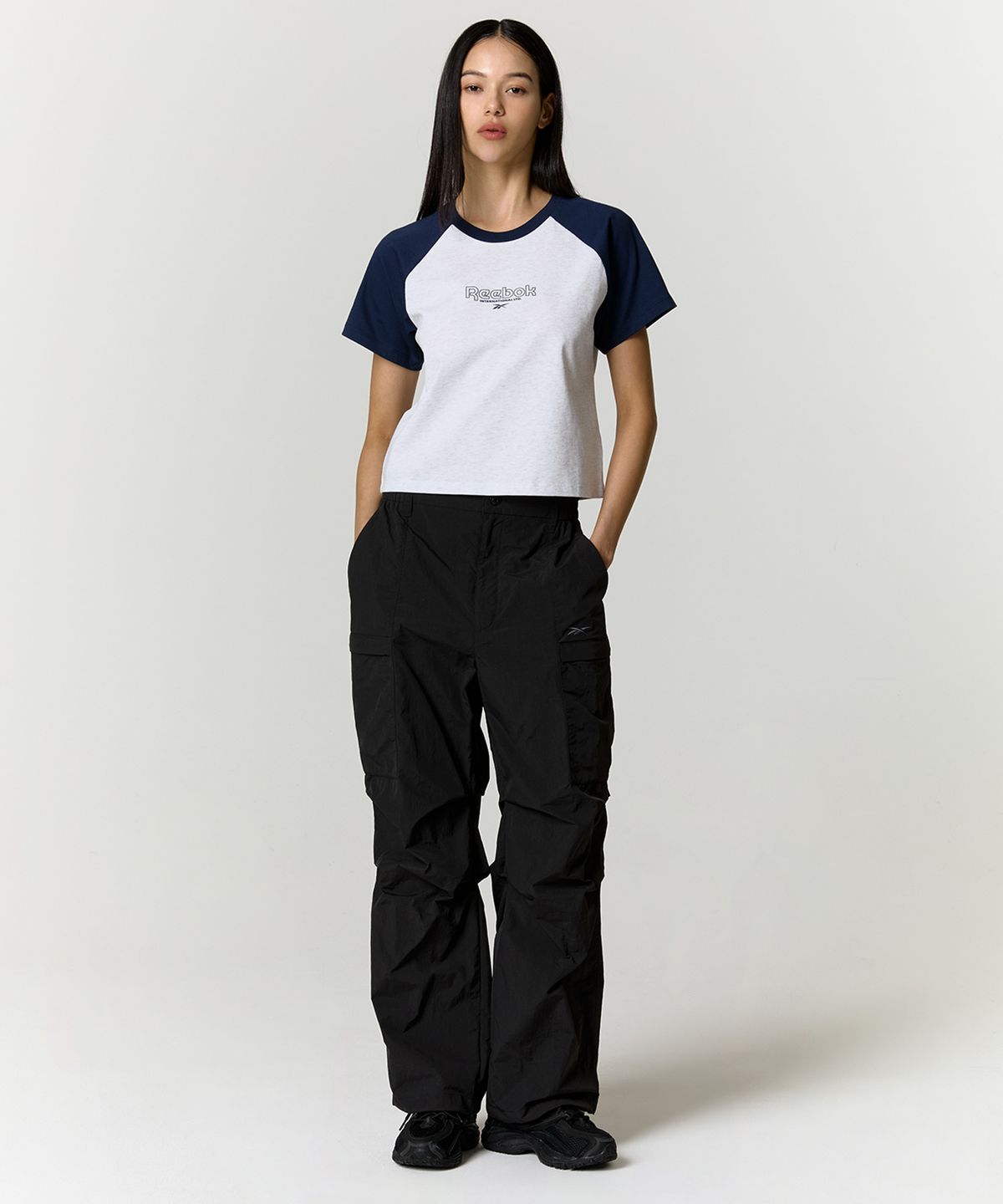 리복(REEBOK) 프린트 래글런 티셔츠 (W) - 네이비