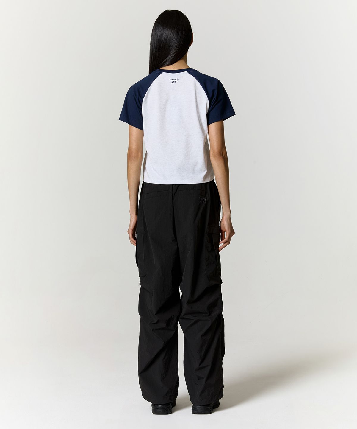 리복(REEBOK) 프린트 래글런 티셔츠 (W) - 네이비
