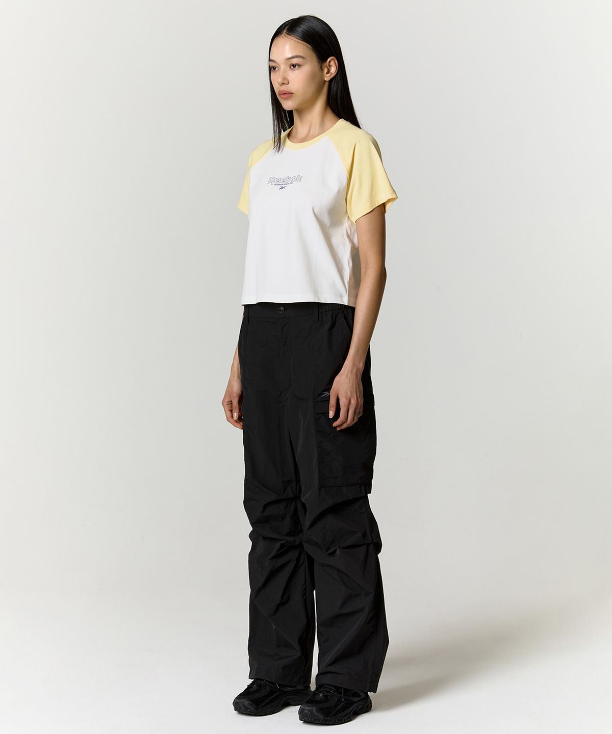 리복(REEBOK) 프린트 래글런 티셔츠 (W) - 버터