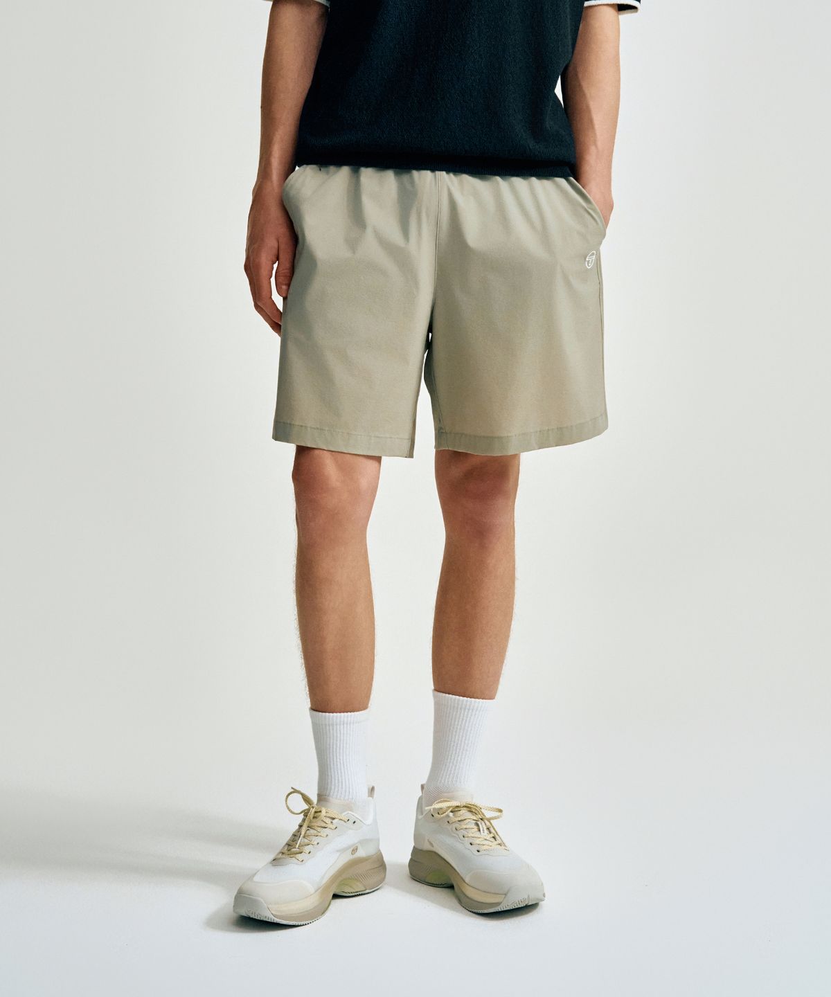 세르지오 타키니(SERGIO TACCHINI) U 컴포트쿨 경량 우븐 7인치 반바지 (L.Khaki)