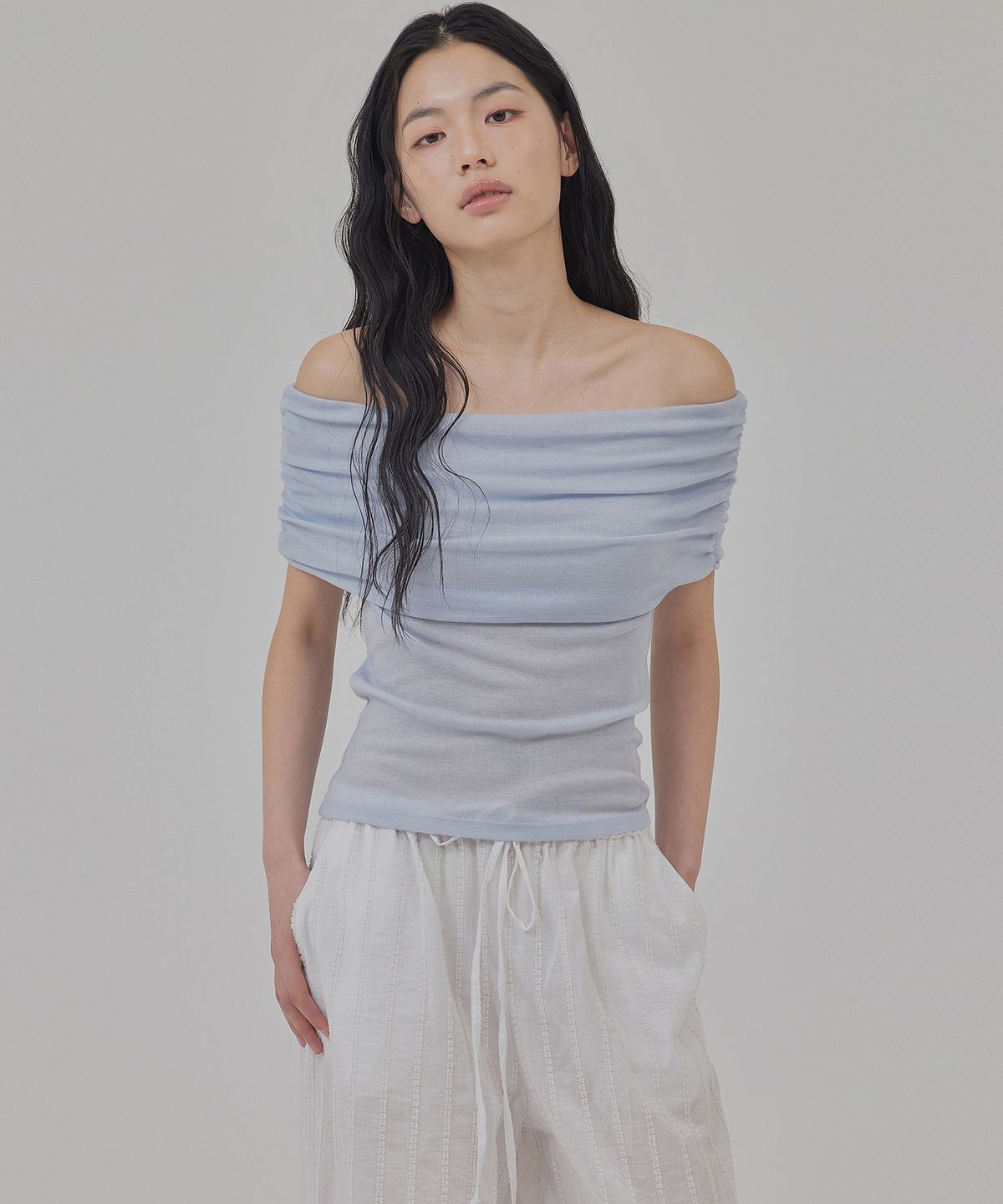 탑걸(TOPGIRL) WOOL TENCIL OFF-SHOULDER TOP_T516TP101