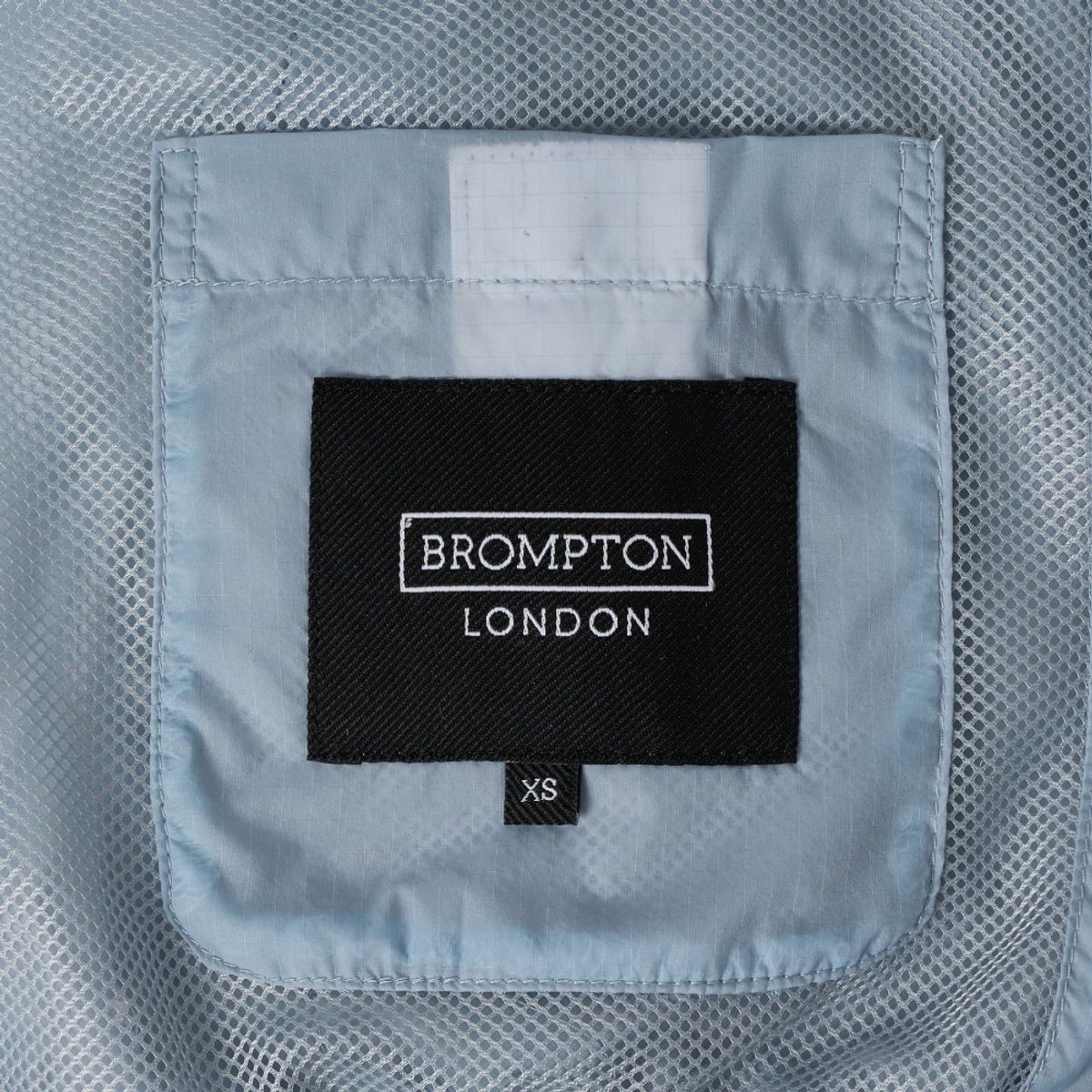 브롬톤 런던(BROMPTON LONDON) W LIGHTWEIGHT WINDBREAKER - L/BLUE (P252WJP130)