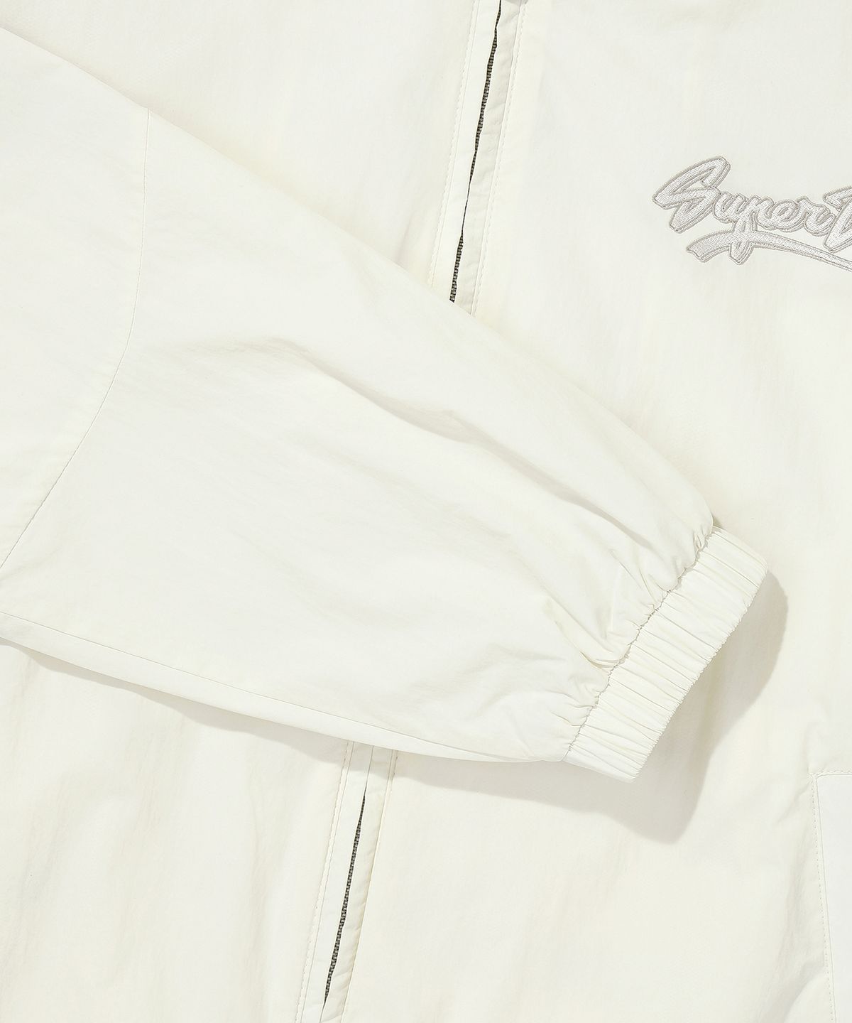 슈퍼드라이(SUPERDRY) 나일론 플라이트 자켓 크림