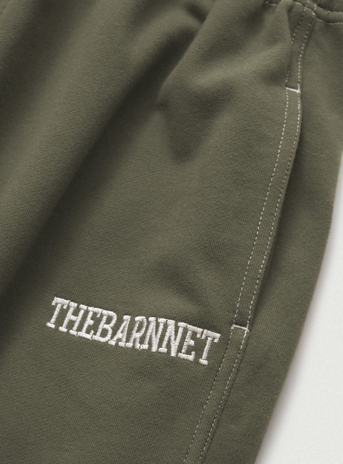 더바넷(THEBARNNET) Campie Sweat Drawstring Jogger Pants_Khaki