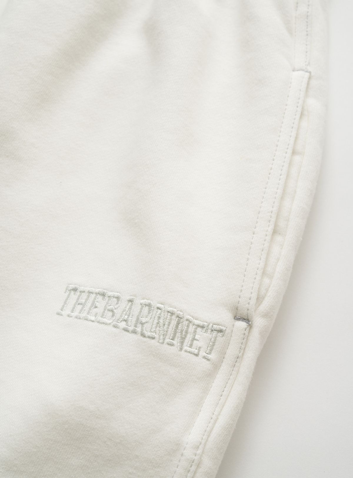 더바넷(THEBARNNET) Campie Sweat Drawstring Jogger Pants_Ivory