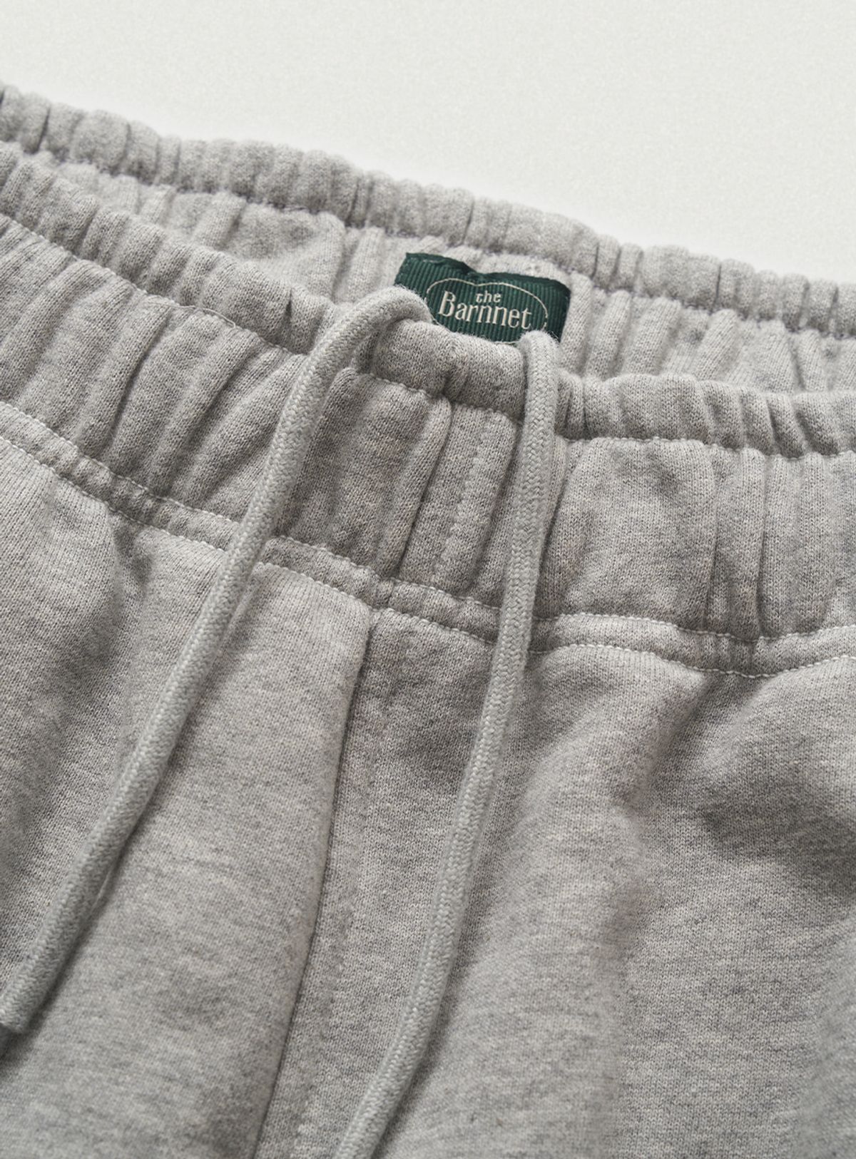 더바넷(THEBARNNET) Campie Sweat Drawstring Jogger Pants_Grey