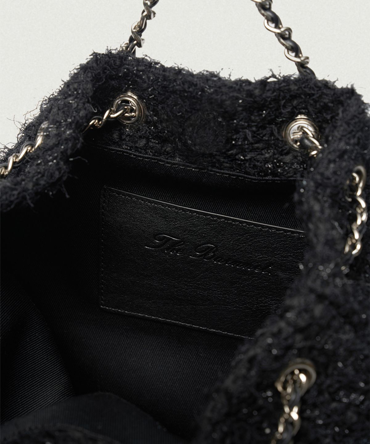 더바넷(THEBARNNET) Tweed Drawstring Chain Backpack_Black