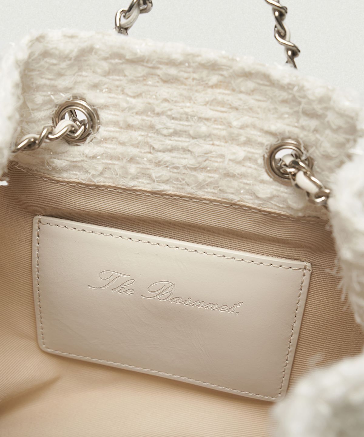 더바넷(THEBARNNET) Tweed Drawstring Chain Backpack_Ivory