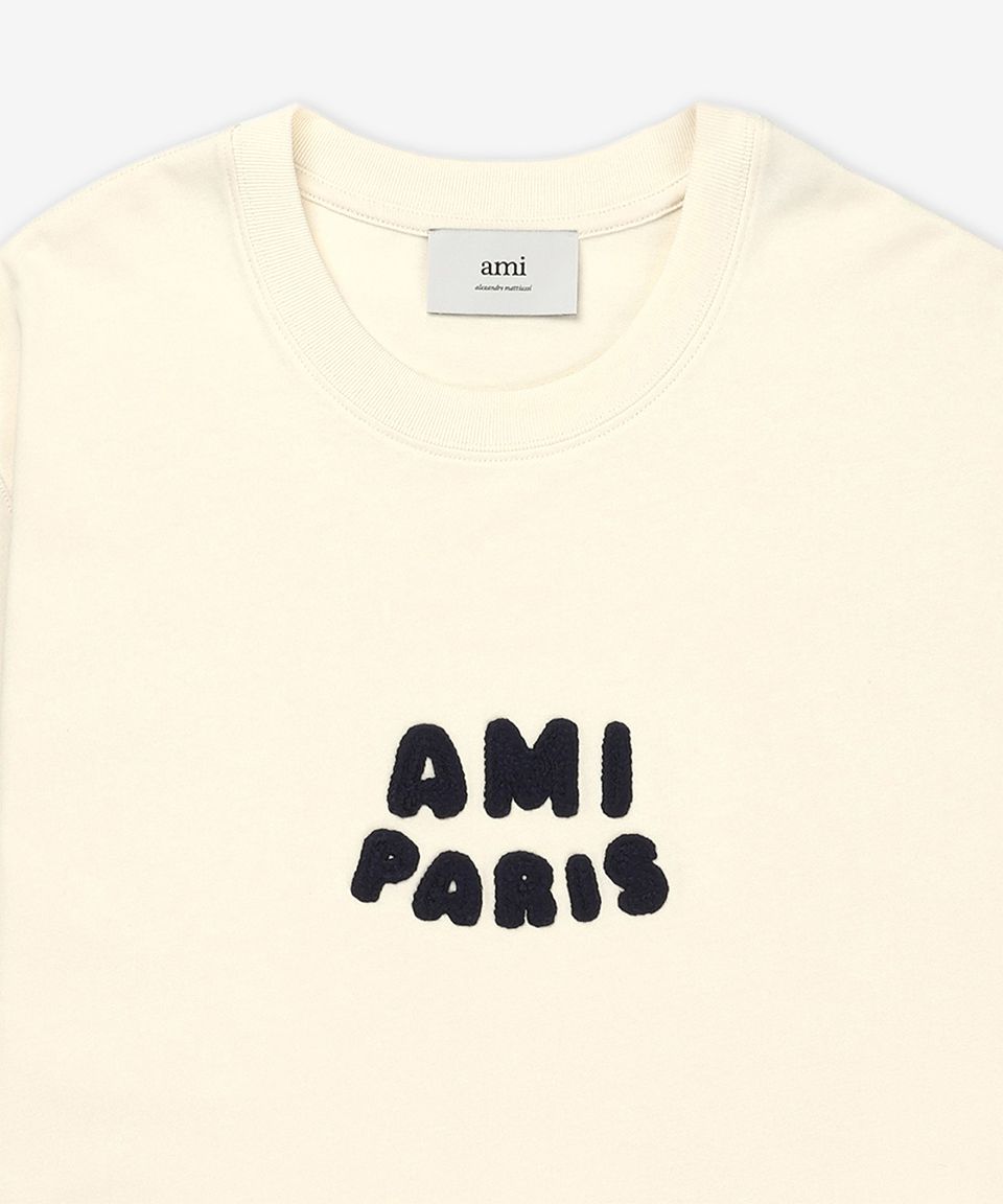 MUSINSA | AMI Paris Logo Patch Short Sleeve T-Shirt - White Cream
