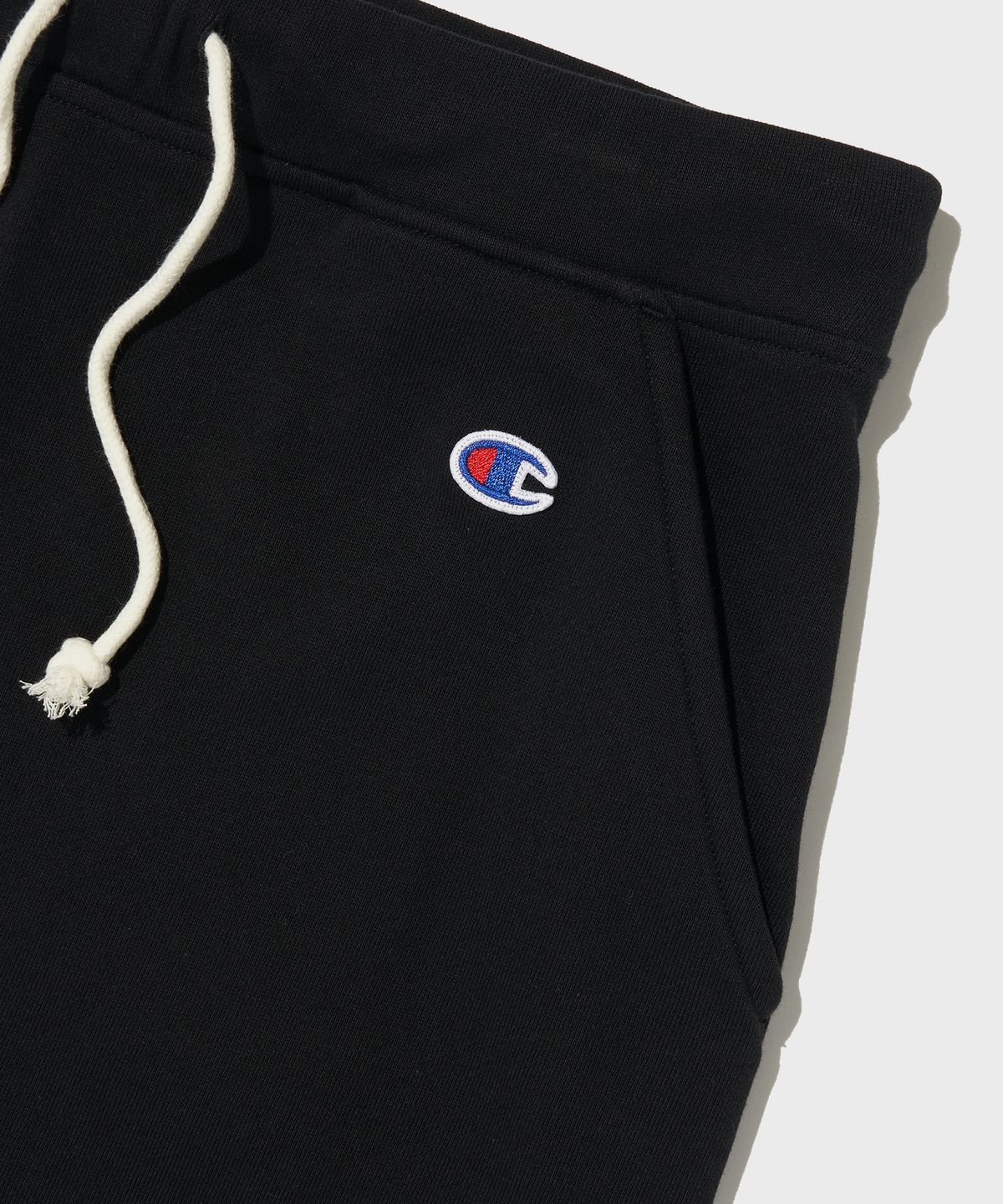 챔피온(CHAMPION) 여성 C로고 롱 스트링 스커트 Black