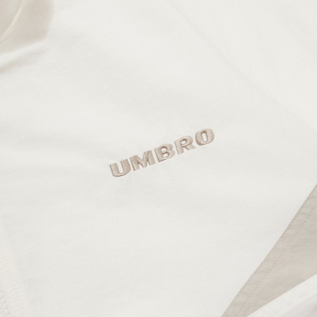엄브로(UMBRO) 레이트 체크아웃 린넨 스탠넥 아노락 아이보리(UQ221CWT49)