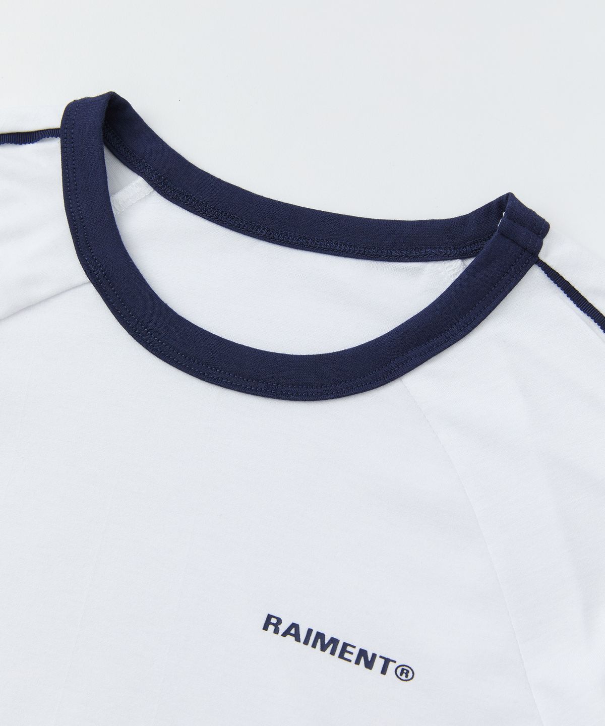 레이몬트(RAIMENT) (W) 우먼즈 파이핑 셔링 크롭 롱슬리브_화이트
