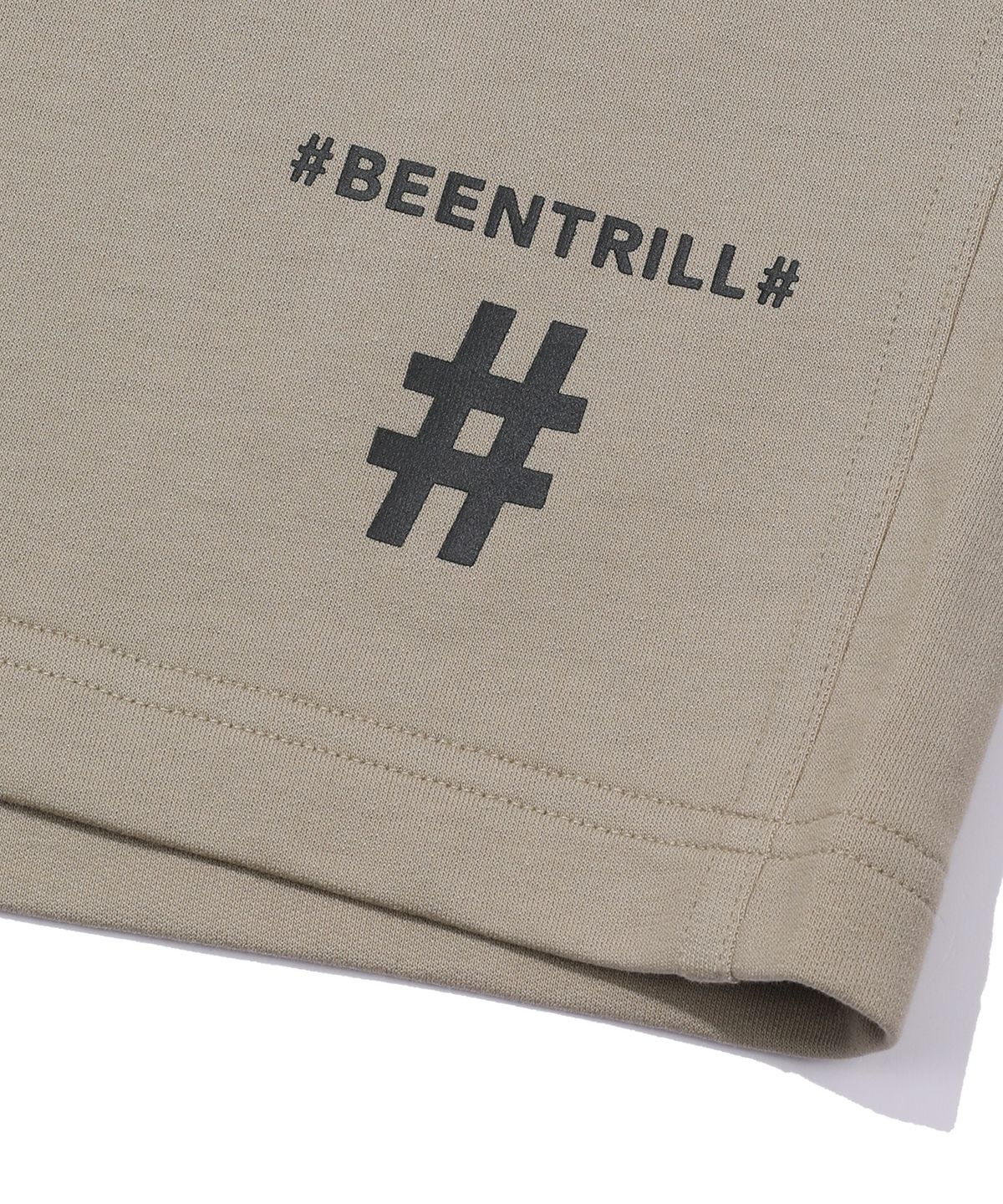 빈트릴(BEENTRILL) 에센셜 해시태그 로고 쇼츠(베이지)