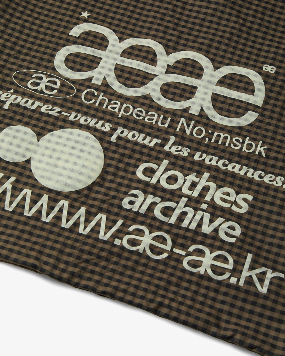 에이이에이이(AEAE) WEB LOGO CHECK GYM SACK [BROWN]