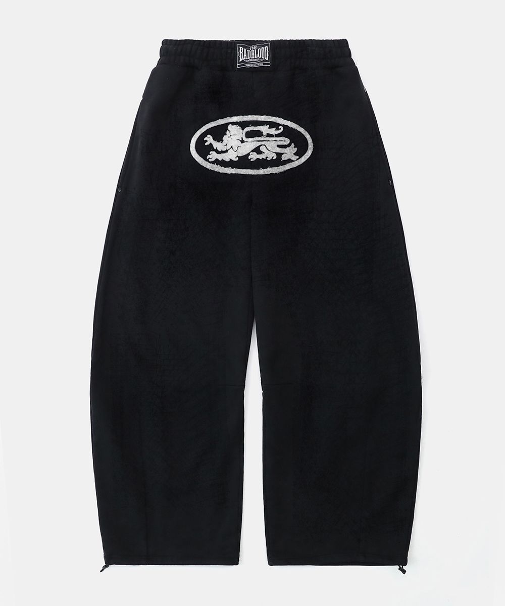 MUSINSA | BADBLOOD Lion Patch 2 Way Curved Jogger - Washed Black